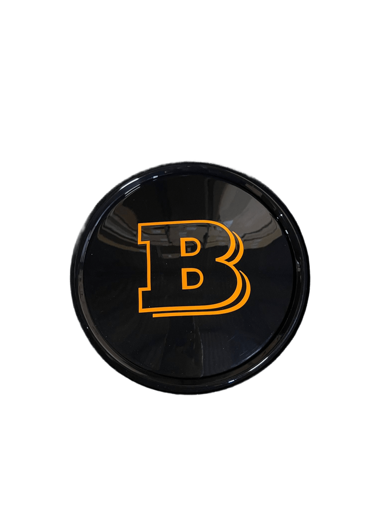Emblemat grilla plastikowy Mercedes-Benz W465 2024-  G-klasa styl Brabus orange